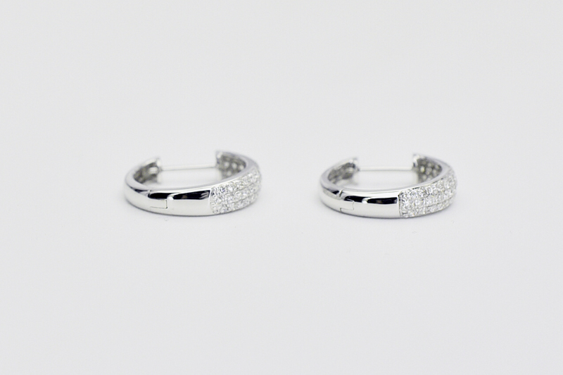 Diamond huggie earrings in white gold