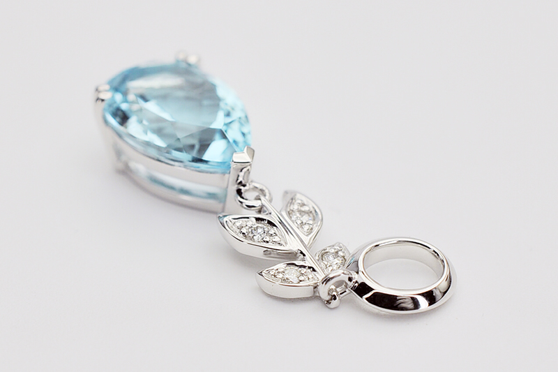 Pear shape blue topaz diamond gold pendant