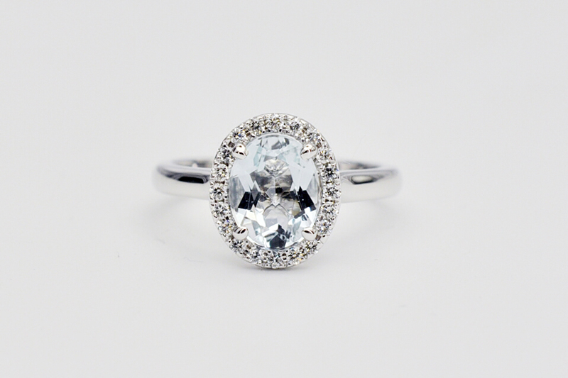 Oval aquamarine diamond halo ring top view