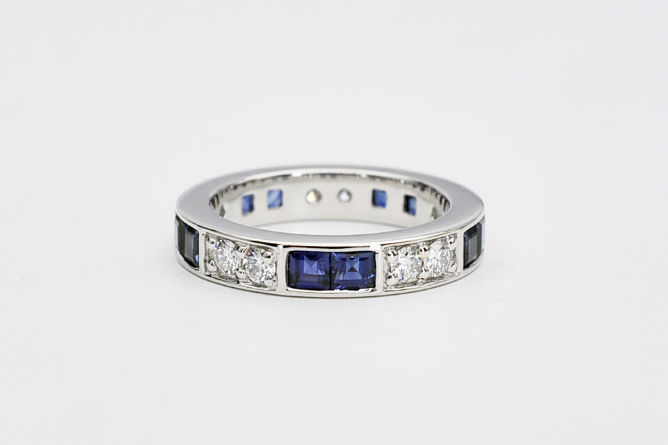 Twin sapphire and diamond platinum ring