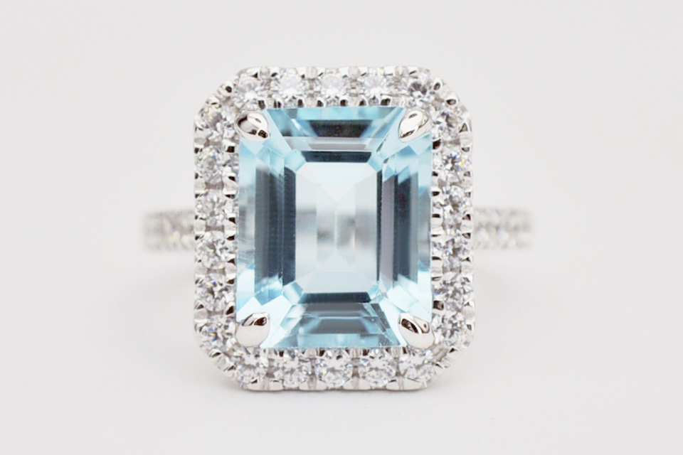 Emerald aquamarine diamond halo ring